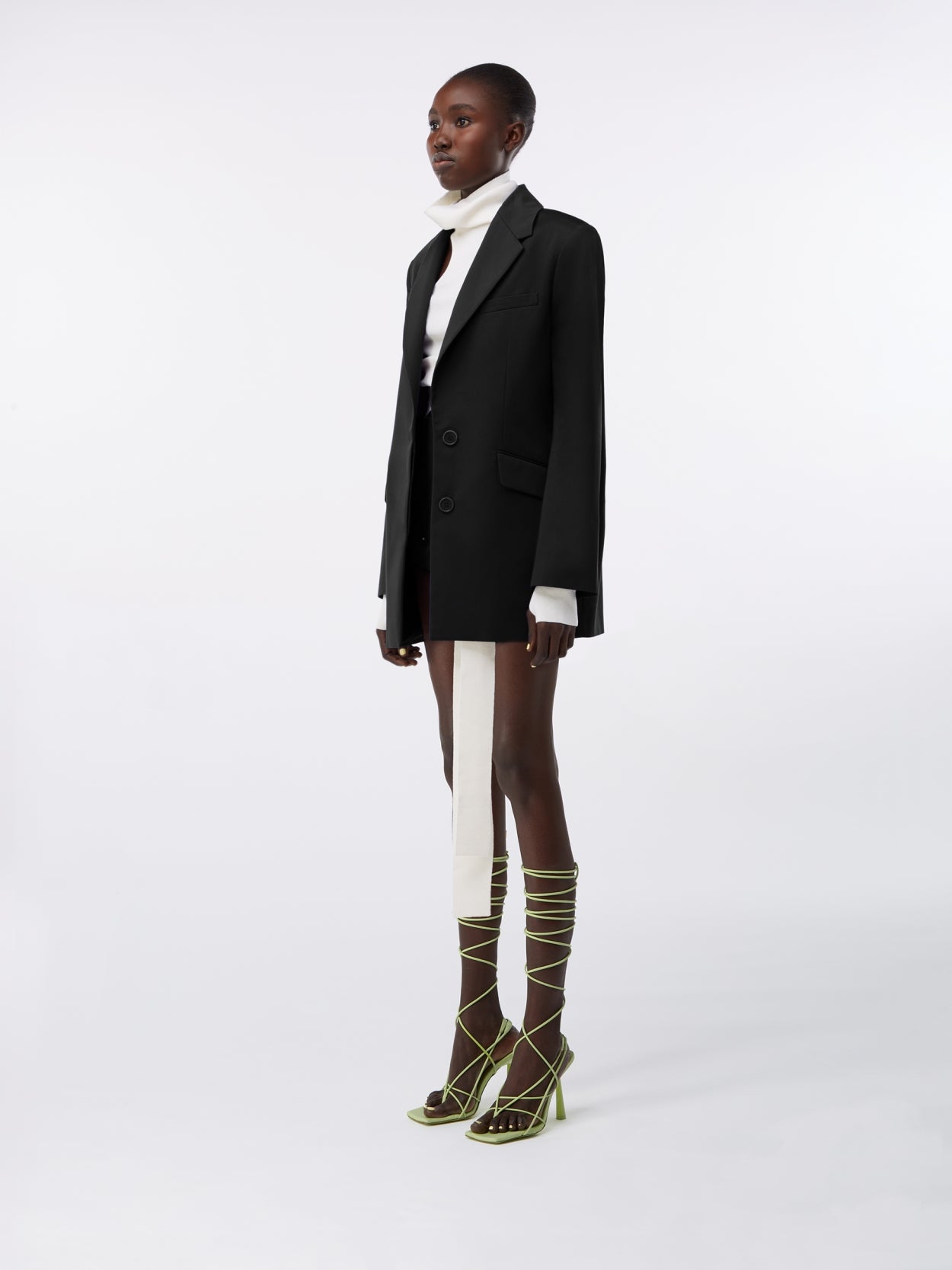 model wearing a black square blazer